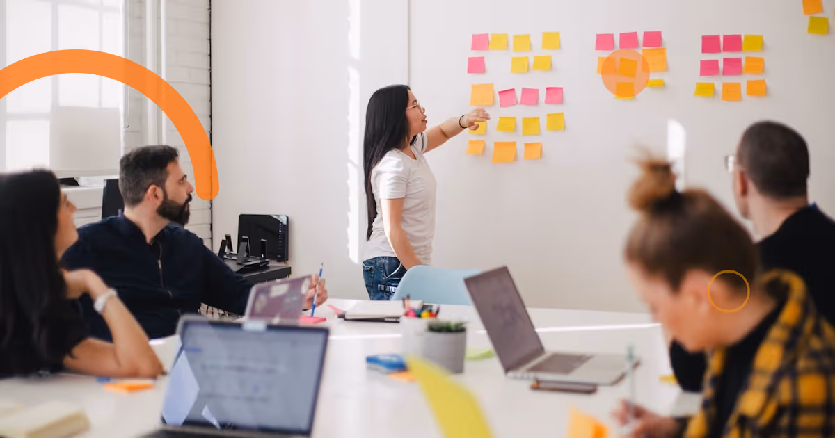 A growing team collaborating in a modern office, representing company culture during scaling.